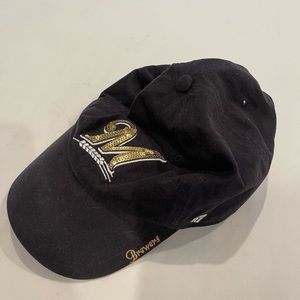 Women’s dark blue Milwaukee Brewers hat with gold sequin logo.
